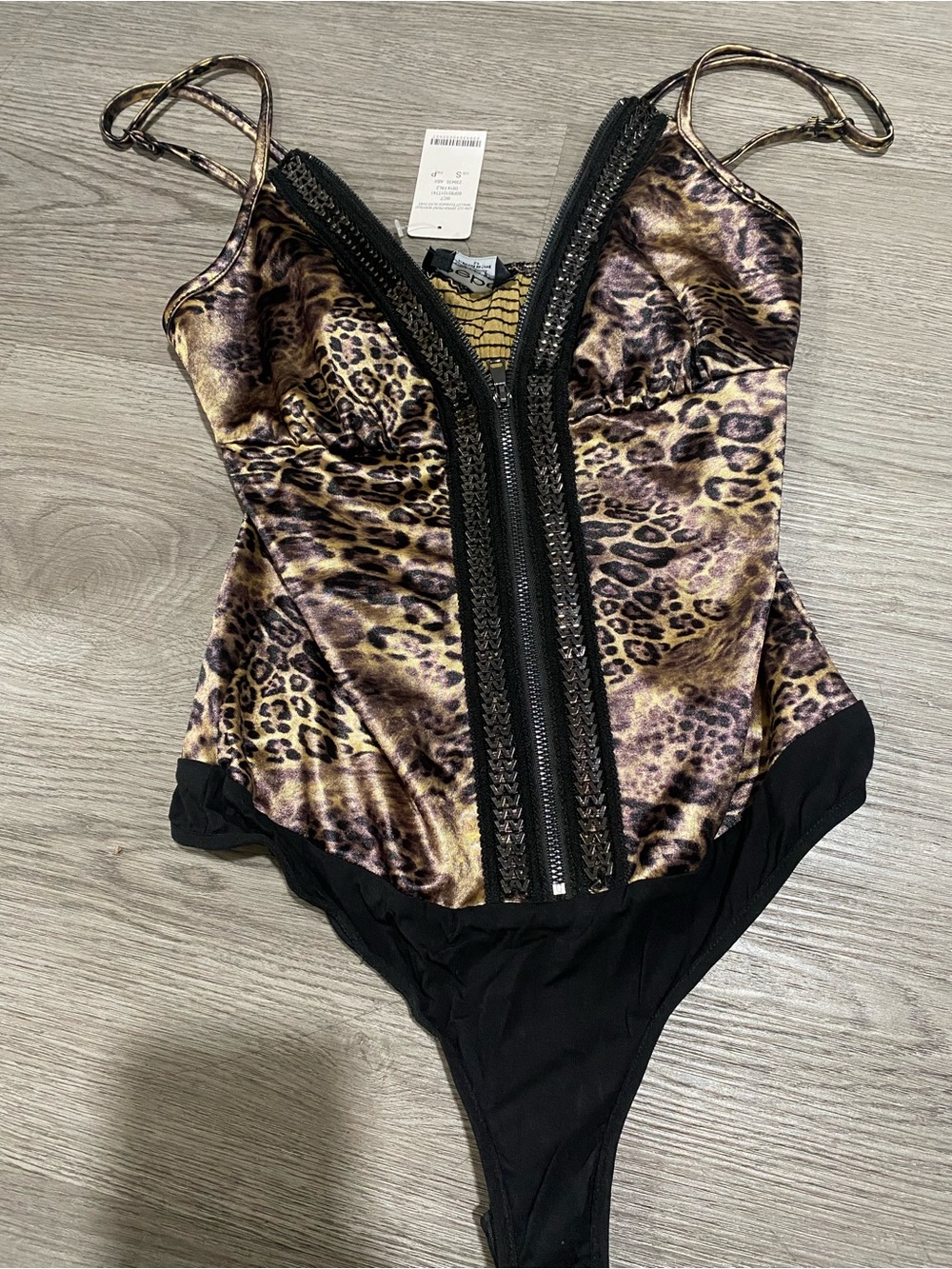 bebe Leopard Print Zip-Front Bodysuit in Black and Gold